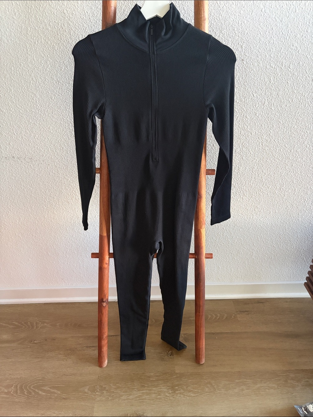 Black Ribbed Long-Sleeve One-Piece Ski Jumpsuit.